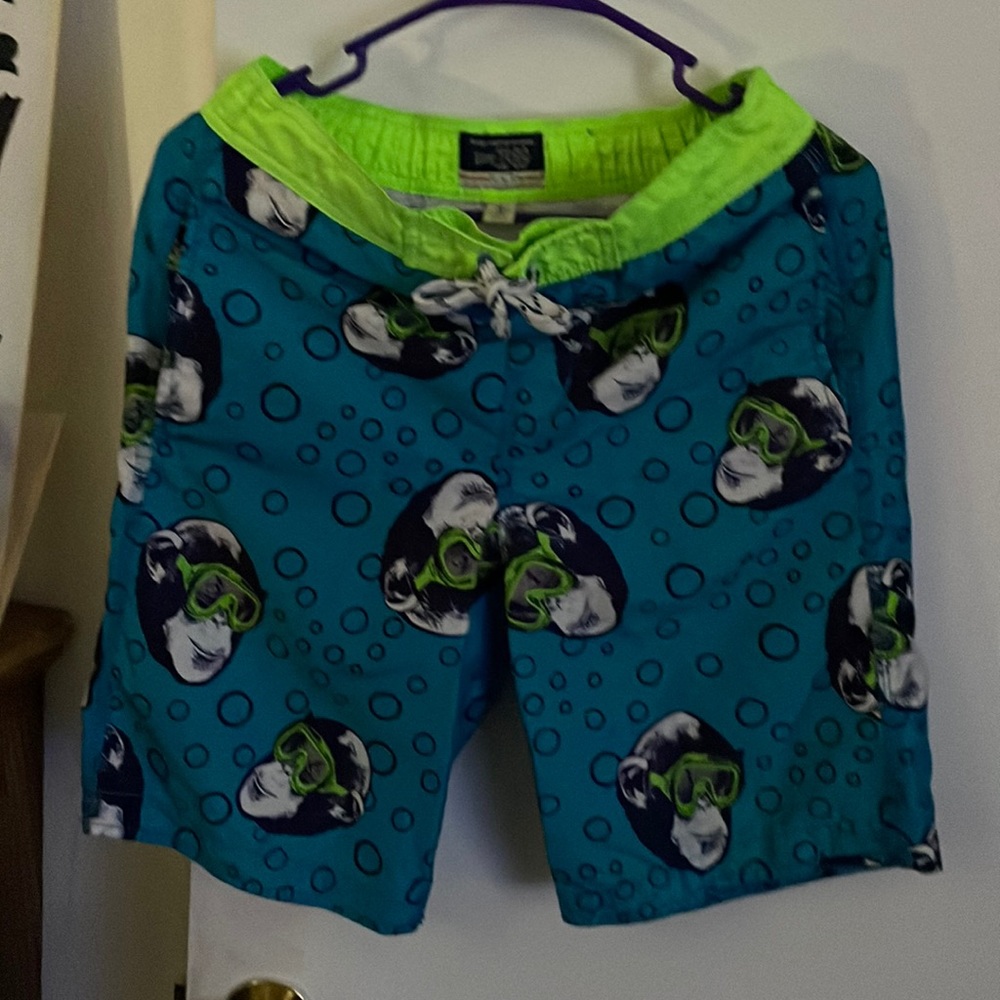 Est 1989 Place swim trunks size 14 NWOT. Very cool print .